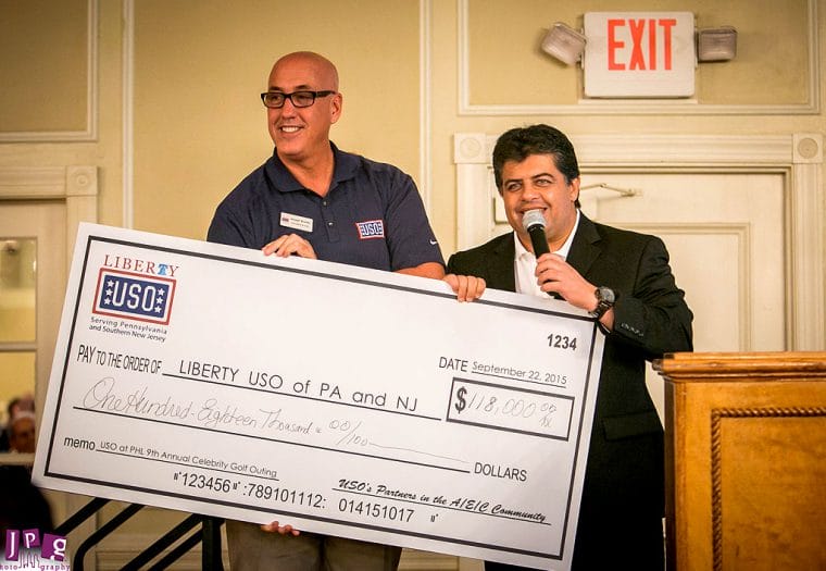 Arora Honored to Present Check to Liberty USO