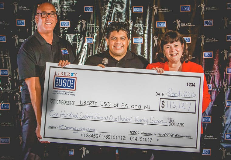 Manik Presenting Check for USO